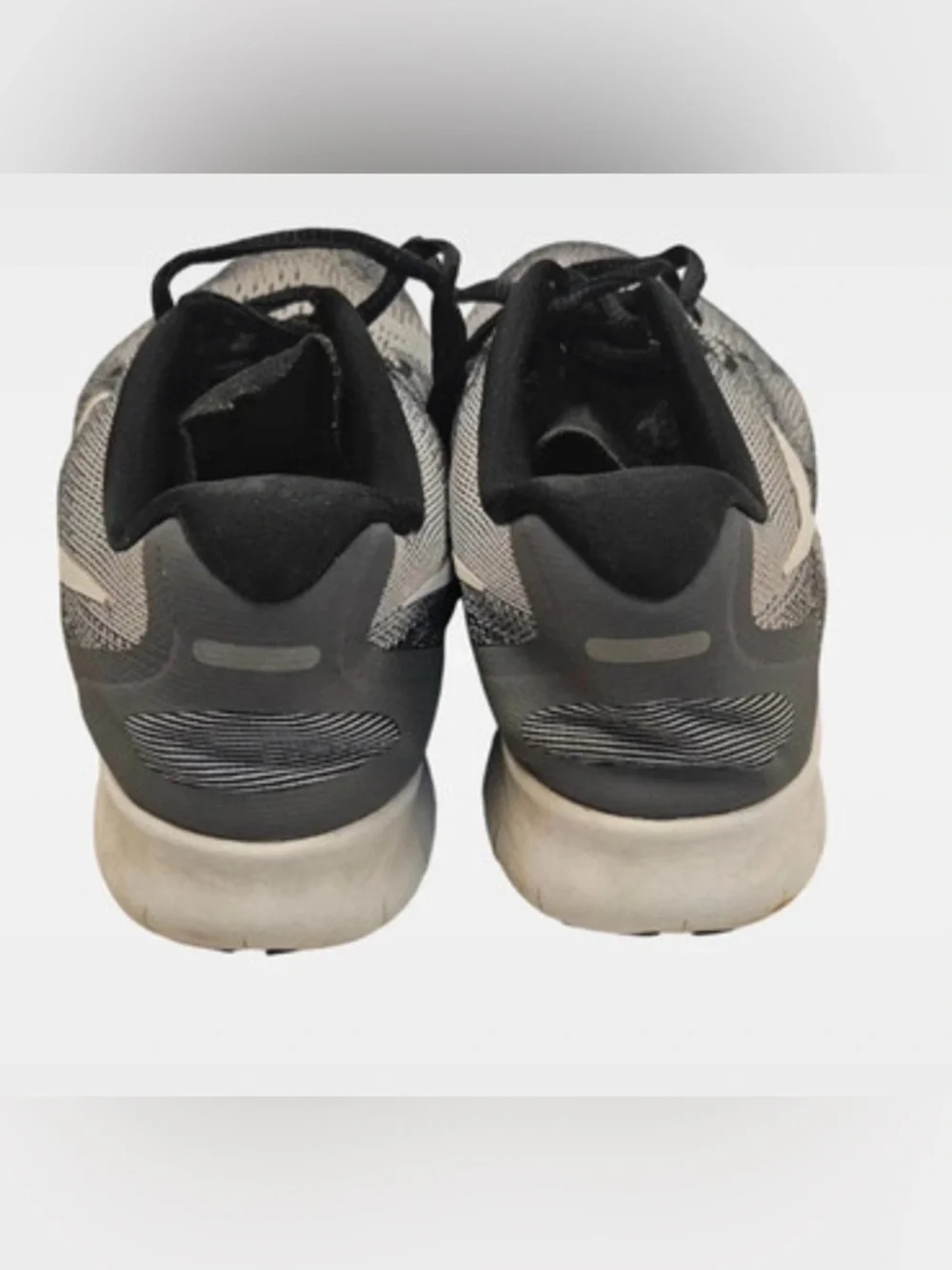 Nike Grey and Black Knit Running Shoes with White Swoosh